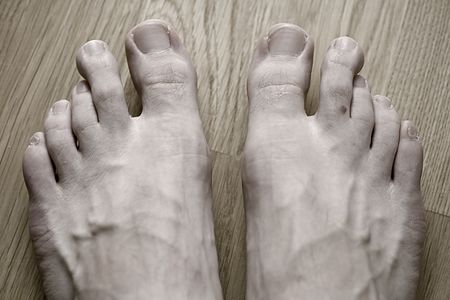 discoloured picture of close up of feet の写真素材