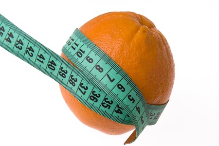 orange with measuring tapeの写真素材