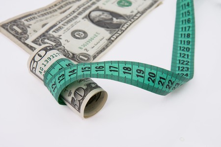 measure tape with american moneyの写真素材