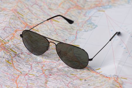 the sunglasses on a mapの写真素材
