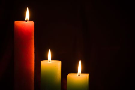 burning candles on dark backgroundの写真素材