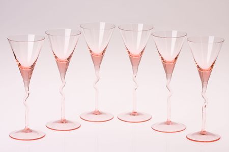 the empty champagne glasses on light backgroundの写真素材