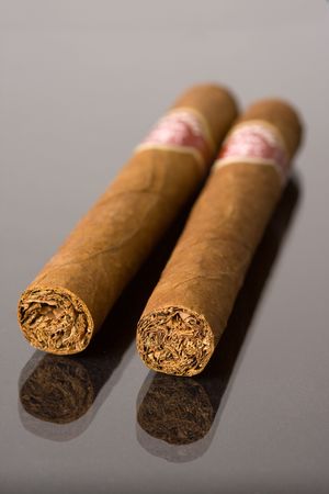 detail of cuban cigars on black backgroundの写真素材