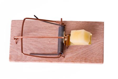 mousetrap with cheese on white backgroundの写真素材