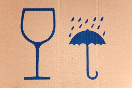 the fragile safety symbols on cardboardの写真素材