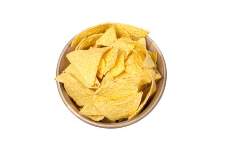 tortilla chips in bowl isolated on white backgroundの写真素材