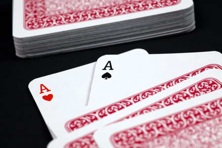 poker cards. two aces on black background