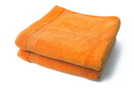 orange towels on white backgroundの写真素材