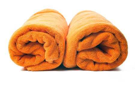 orange towels on white backgroundの写真素材