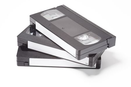 VIDEO TAPE CASSETTE ON WHITE BACKGROUNDの写真素材