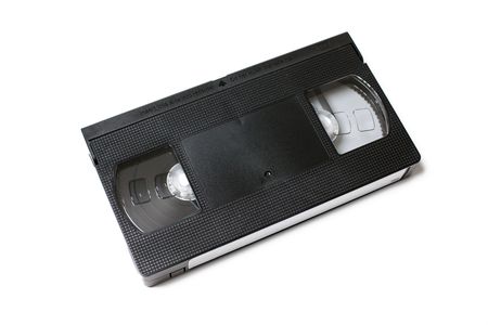 VIDEO TAPE CASSETTE ON WHITE BACKGROUNDの写真素材
