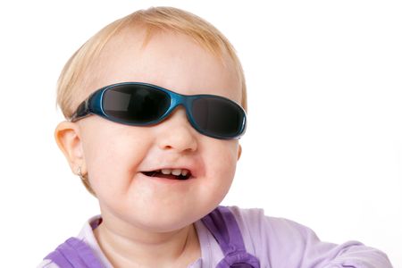 baby with sunglasses on white backgroundの写真素材