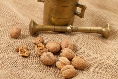 the walnuts laying on juteの写真素材