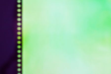 film strip on abstract color backgroundの写真素材