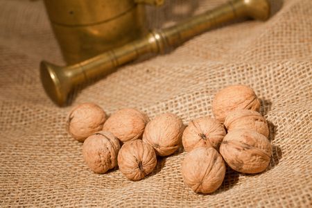 the walnuts laying on juteの写真素材