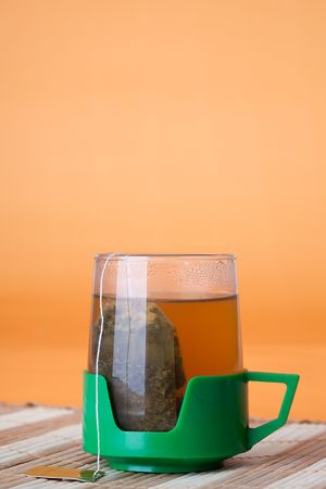 glassy tea cup with teabag
の写真素材