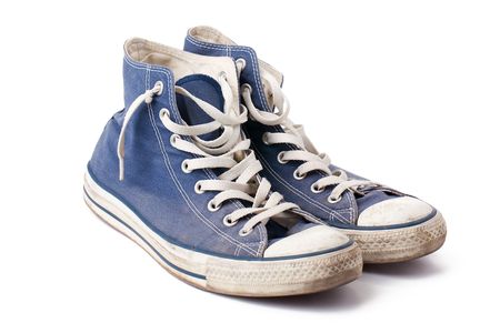 the blue sneakers on white backgroundの写真素材