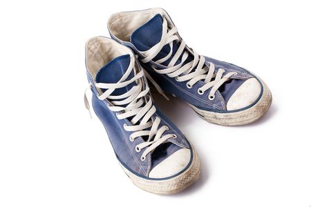 the blue sneakers on white backgroundの写真素材