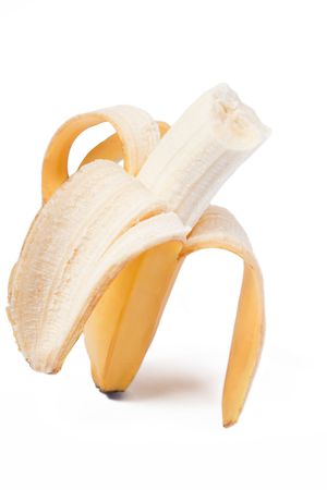 photo shot of peeled fresh banana on white backgroundの写真素材