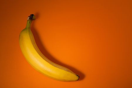 the photo shot of fresh banana on color backgroundの写真素材