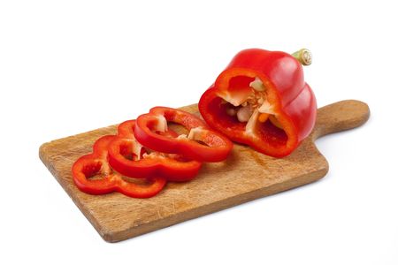 photo shot of cutting red pepper on woodの写真素材