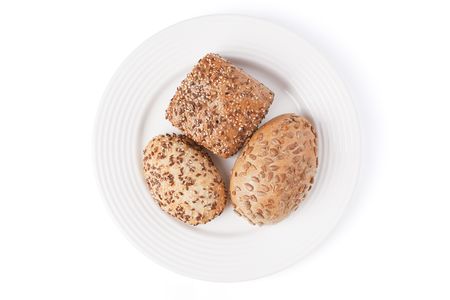 the bread rolls on white plateの写真素材