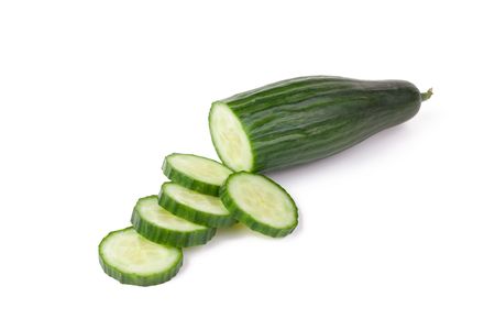 the sliced cucumber isolated on white backgroundの写真素材