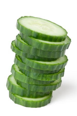 the sliced cucumber isolated on white backgroundの写真素材