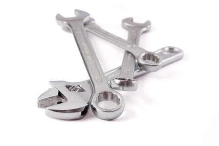 the chrome spanners on white backgroundの写真素材