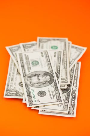 the photo shot of dollars on color backgroundの写真素材