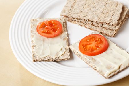 healthy food with crispbread and tomatoの写真素材