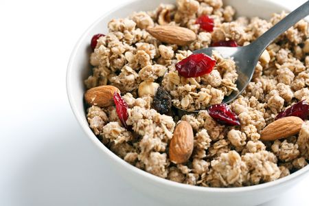 bowl of muesli on white backgroundの写真素材