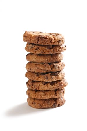 pile of chocolate cookies on white backgroundの写真素材