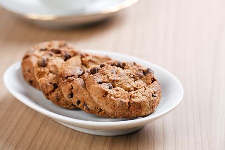 chocolate cookies on wooden backgroundの写真素材