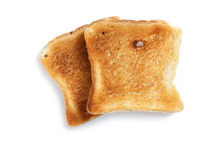 slice of toasted bread on white backgroundの写真素材
