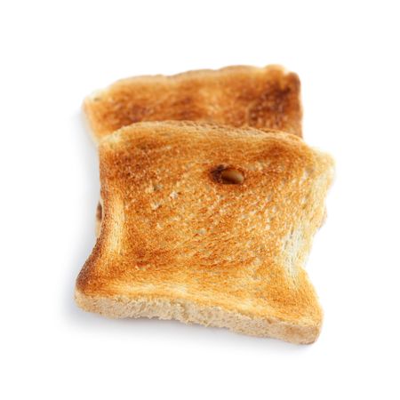 slice of toasted bread on white backgroundの写真素材