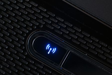 shining wifi button on computerの写真素材