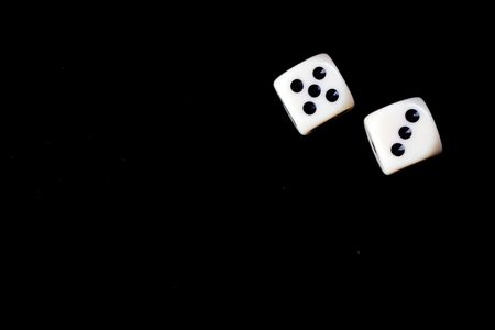 two dice on black background