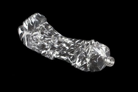 photo shot of plastic bottle on black backgroundの写真素材