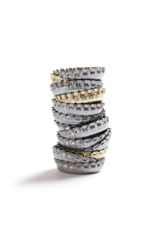 beer caps on white backgroundの写真素材