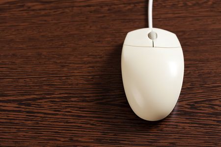 photo shot of computer mouse on tableの写真素材