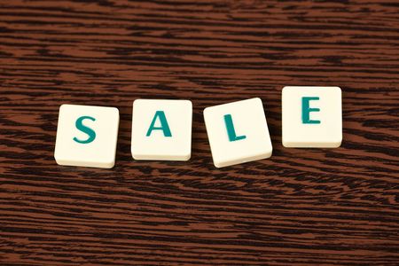 word sale on wooden backgroundの写真素材