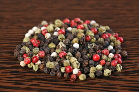 color pepper on wooden tableの写真素材