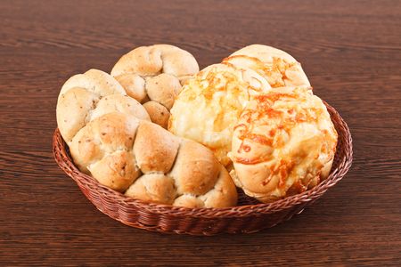 the bread rolls on wooden tableの写真素材