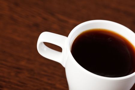 coffee cup on wooden tableの写真素材