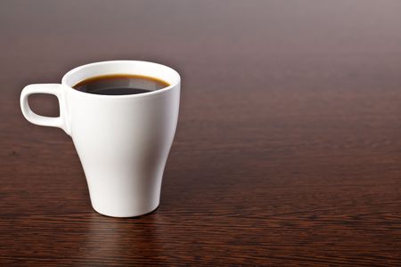 coffee cup on wooden tableの写真素材