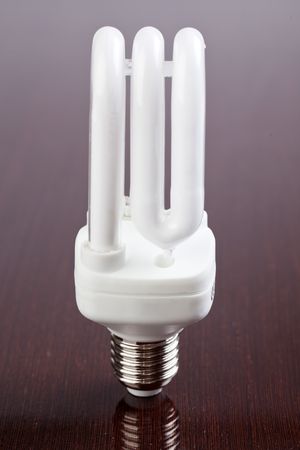 energy saving bulb on wooden tableの写真素材