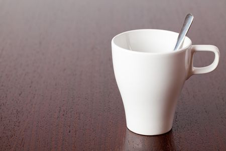 the coffee cup on wooden tableの写真素材