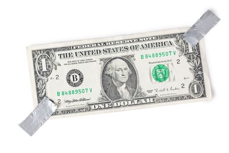 paper currency and tape on white backgroundの写真素材