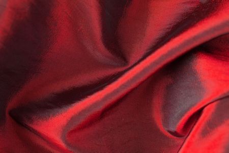 background with red satin fabricの写真素材